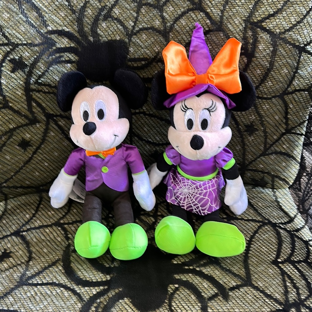 Disney Halloween.  Plush Minnie and Mickey dressed in their Halloween best